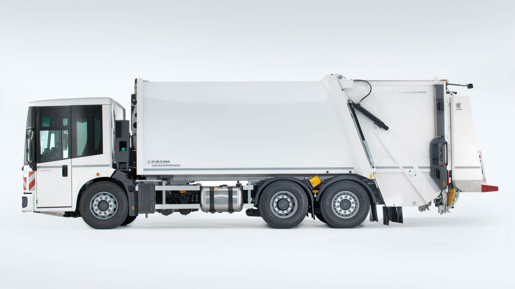 Side view of a white Econic in municipal use for waste disposal on a white background. 