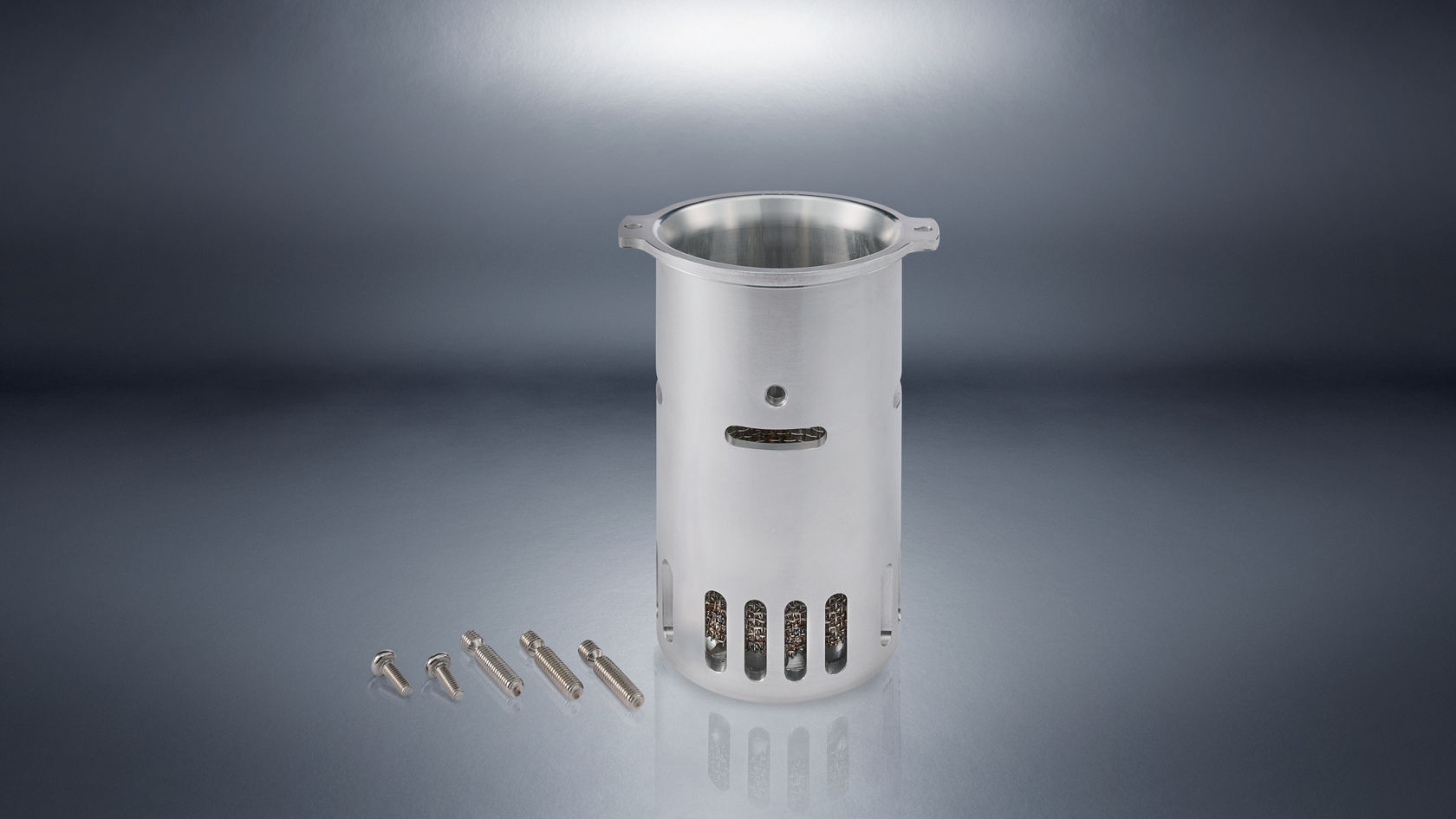 Metal cylinder with ventilation slots and separate screws, FuelSeal from Mercedes-Benz Trucks.