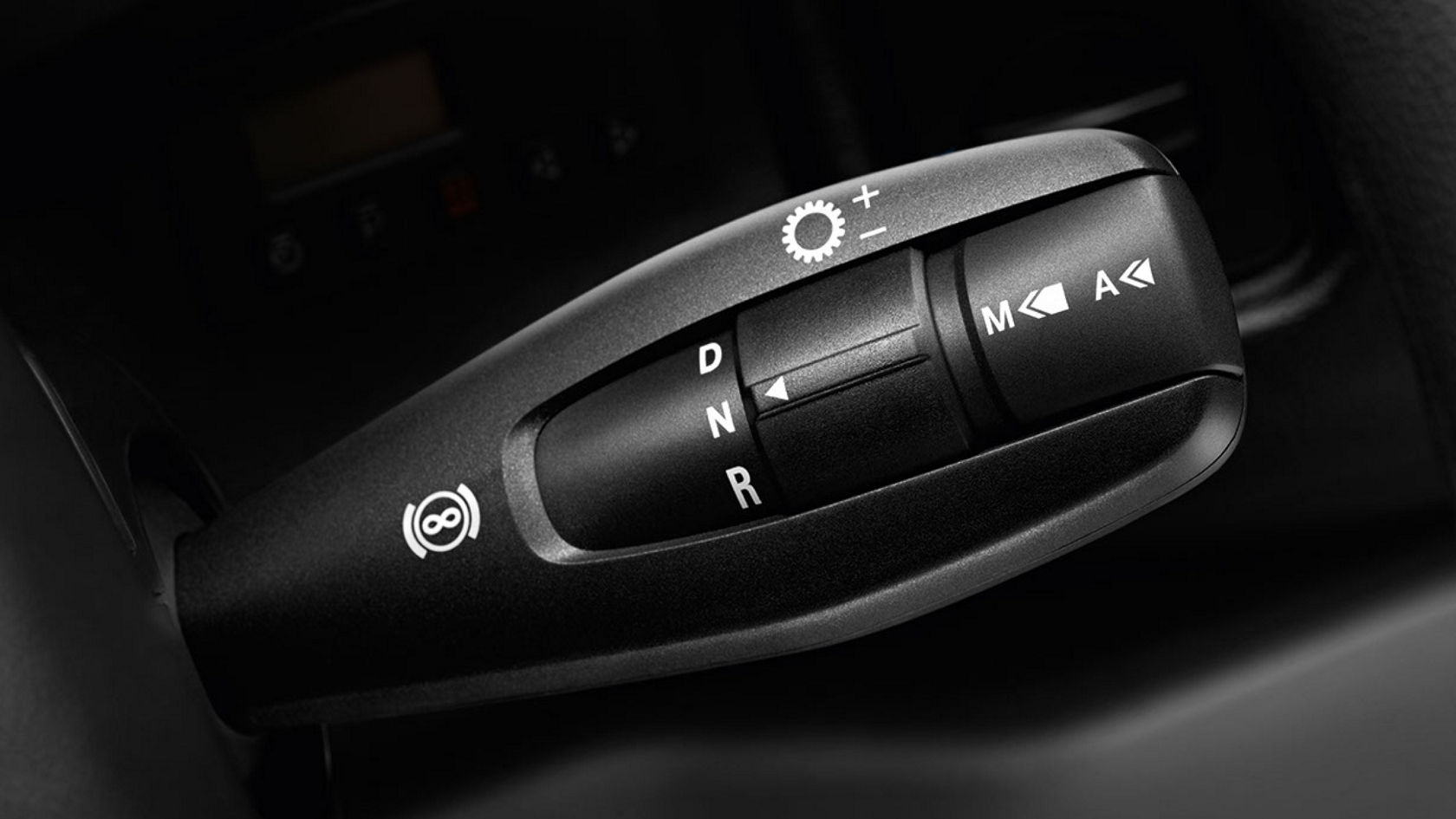 Close-up of an automatic transmission gearshift lever. The gearshift lever shows the positions D, N, R, M, and A, as well as the symbols for the electronic parking brake and the shift paddles.