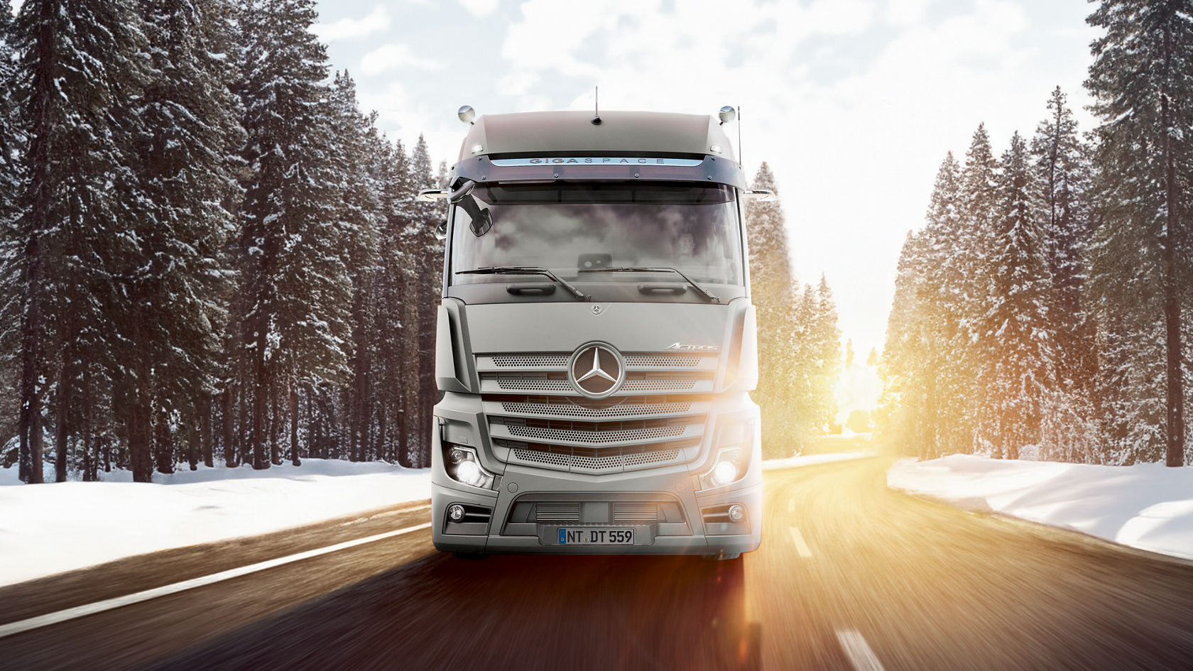 Man working on the engine of a Mercedes-Benz truck